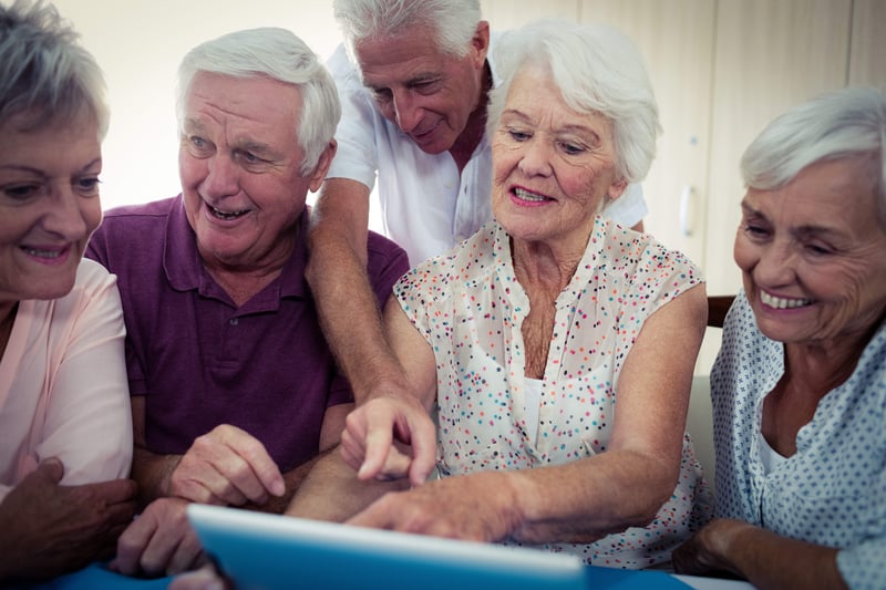 Group of seniors using a computer