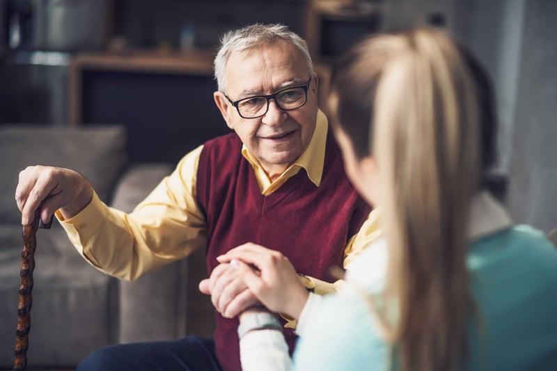 A home doctor is visiting a senior man to check his health