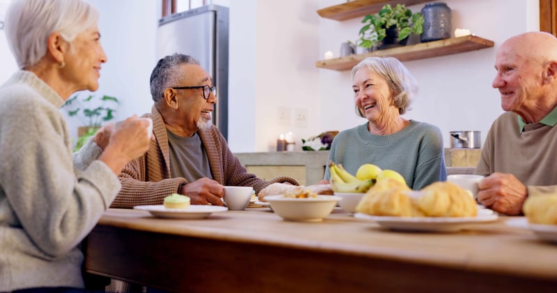 Group of senior people in the living room of a senior living community