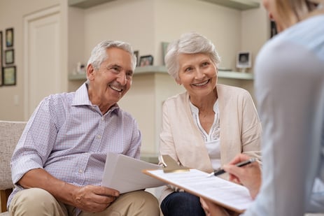 Senior couple meeting a financial advisor