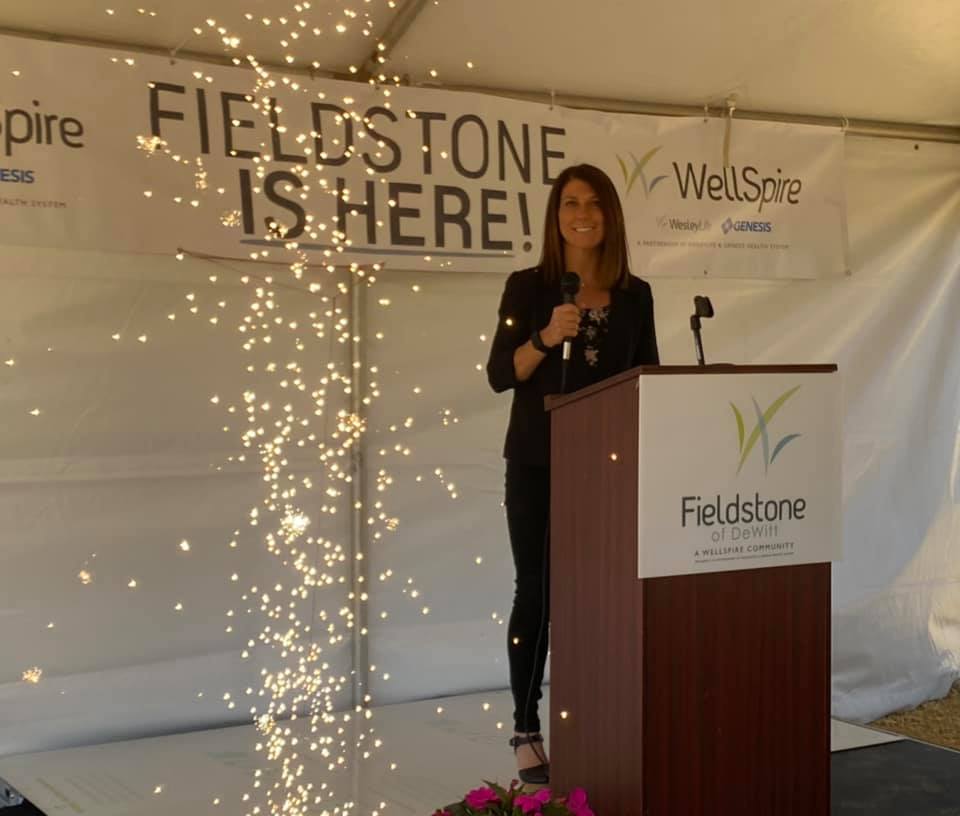 A woman speaking at a Fieldstone event