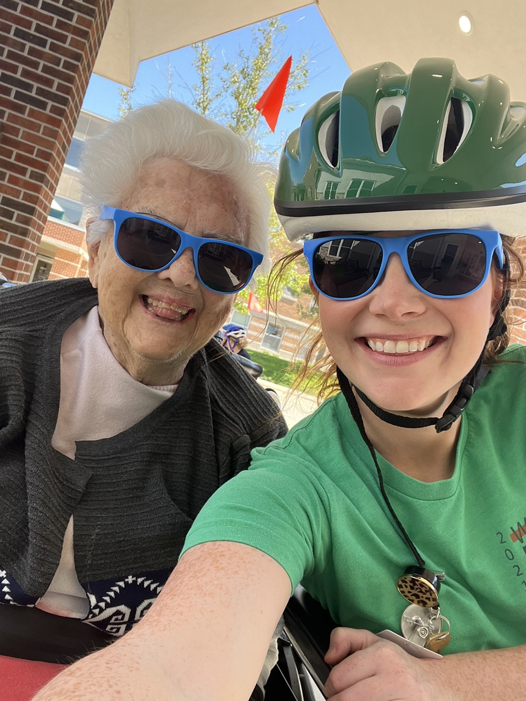 resident and instructor smiling