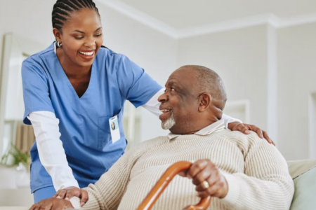 Nurse helping senior man