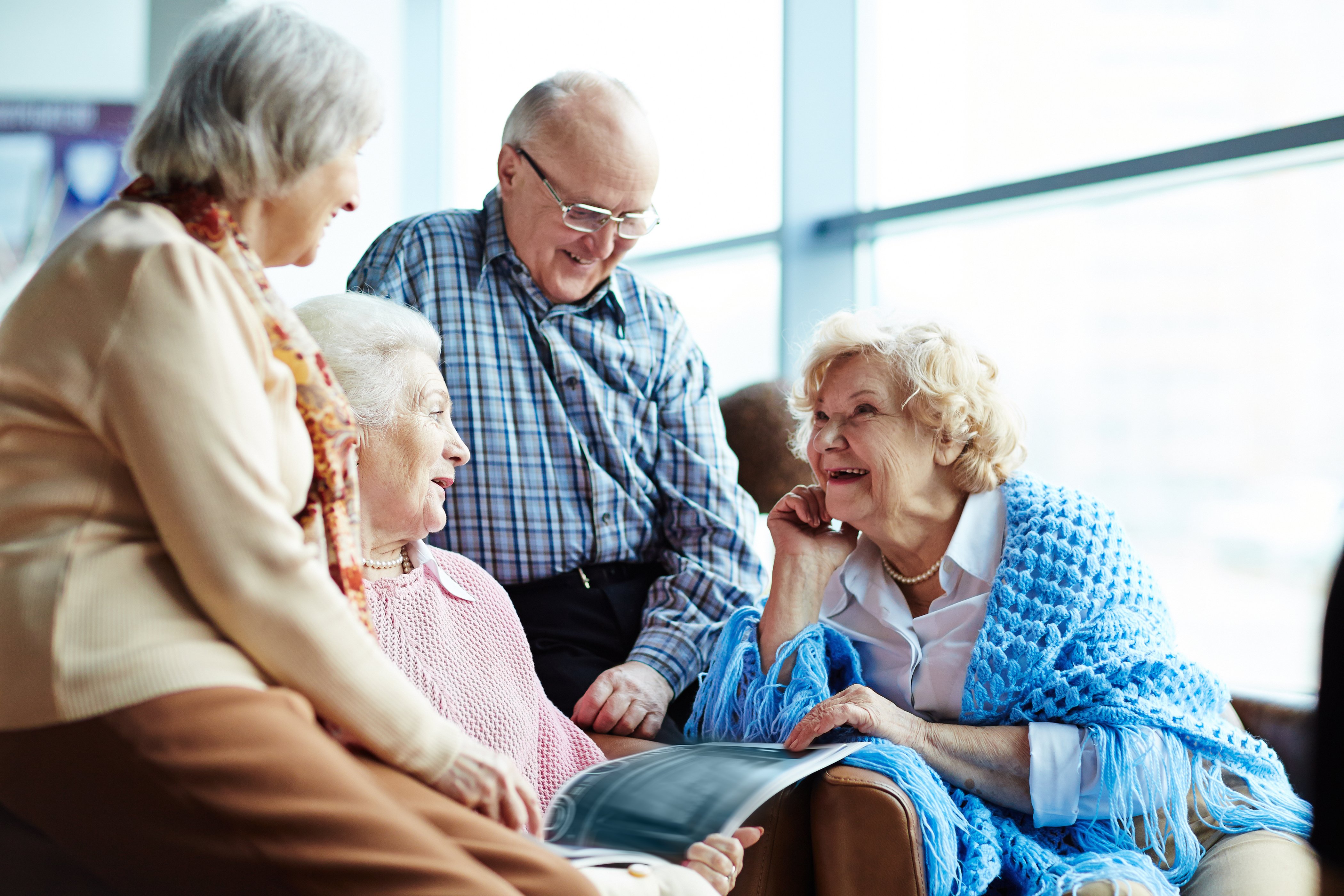 A group of seniors chatting. 