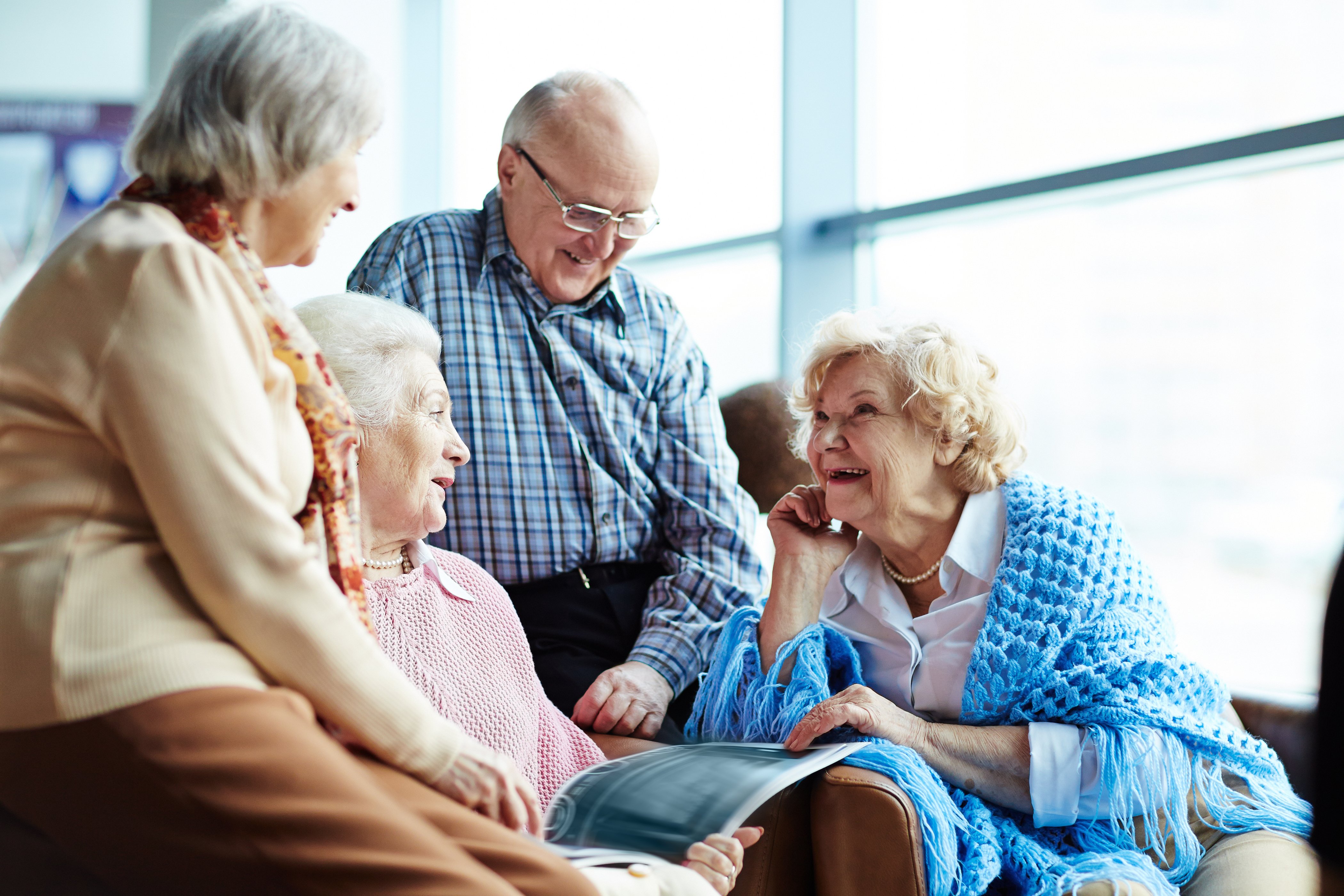 A group of seniors chatting. 