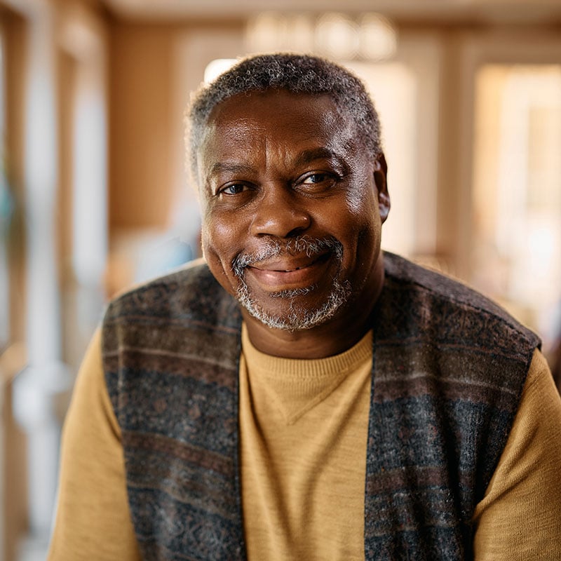 older man smiling