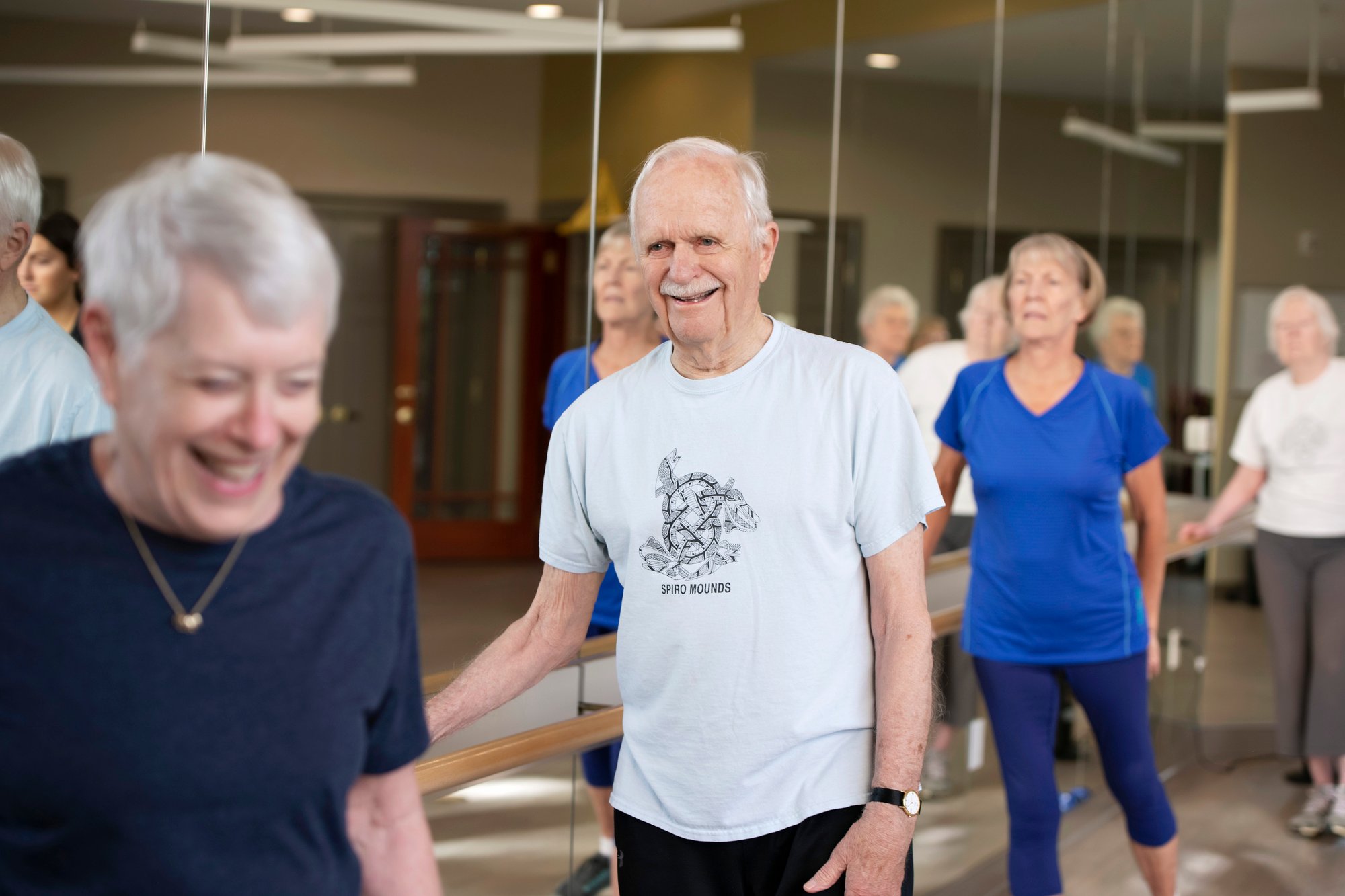 friends laughing in a workout class