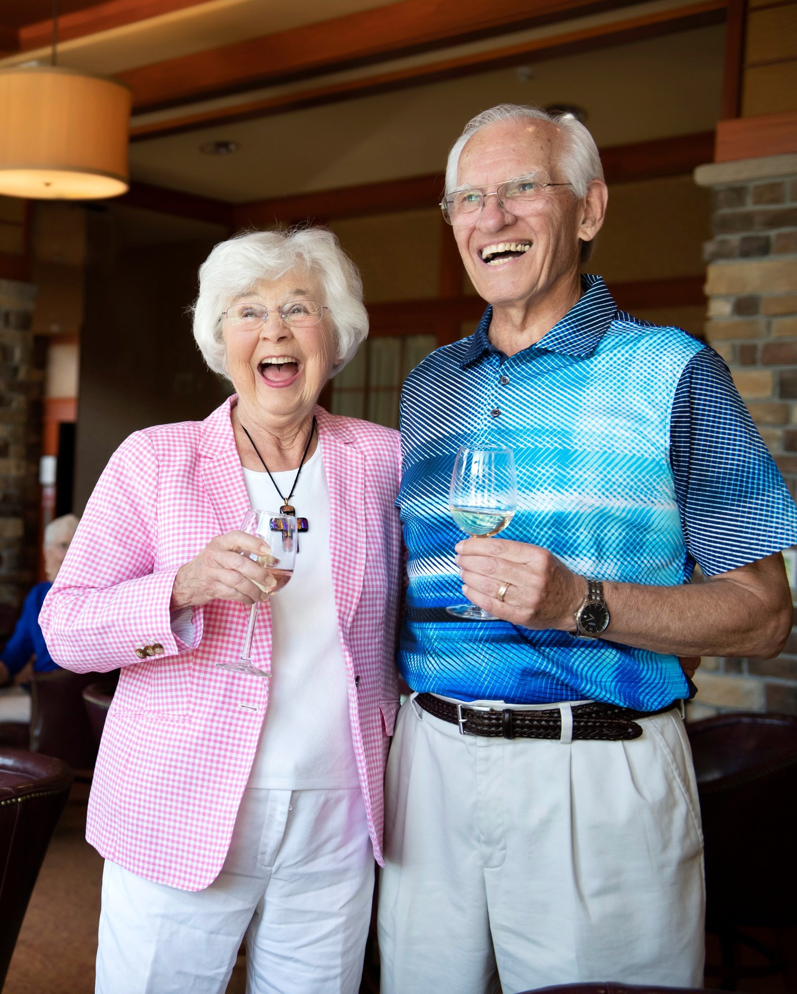 senior man and woman smiling together