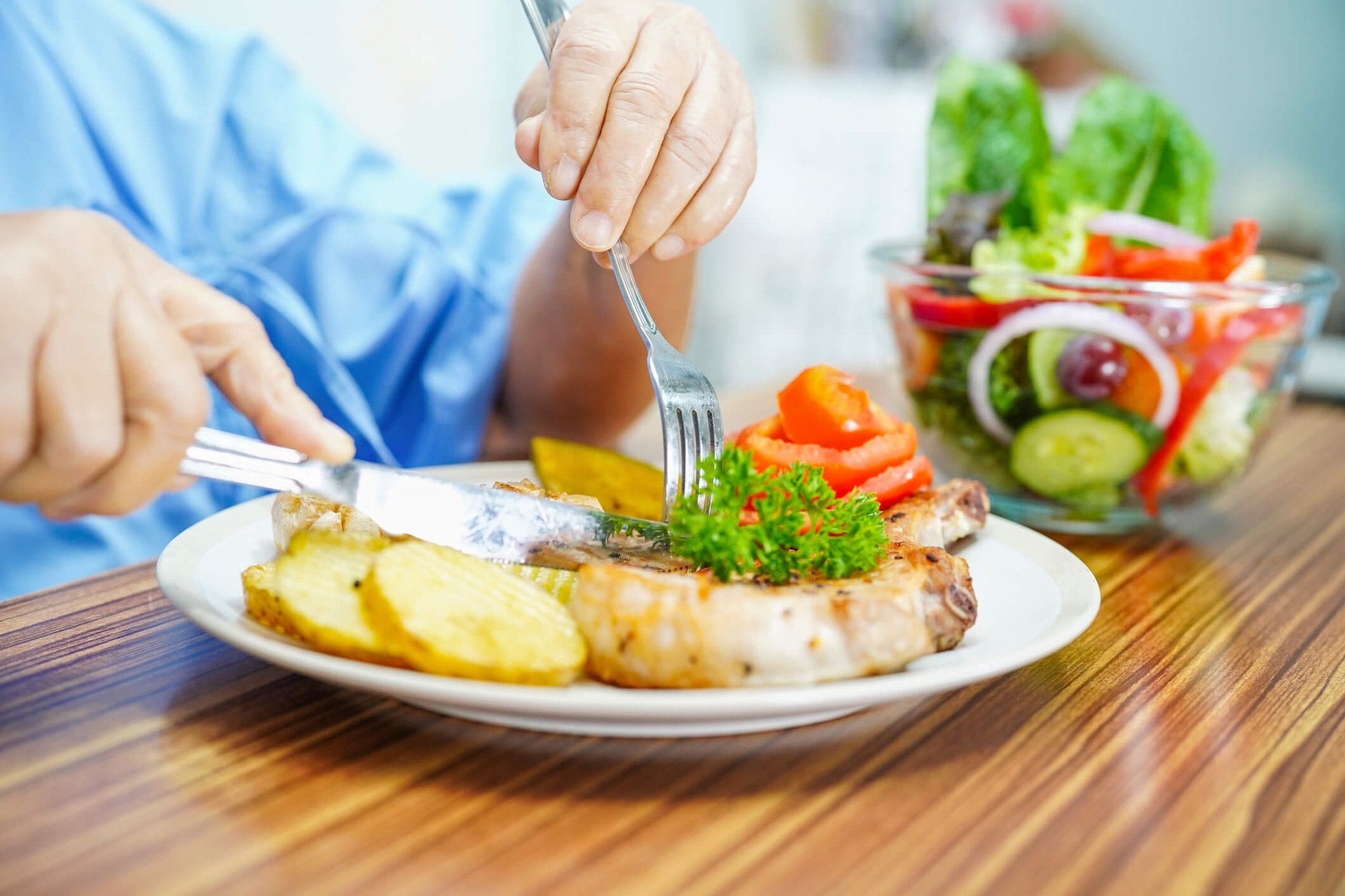 cutting into food on plate