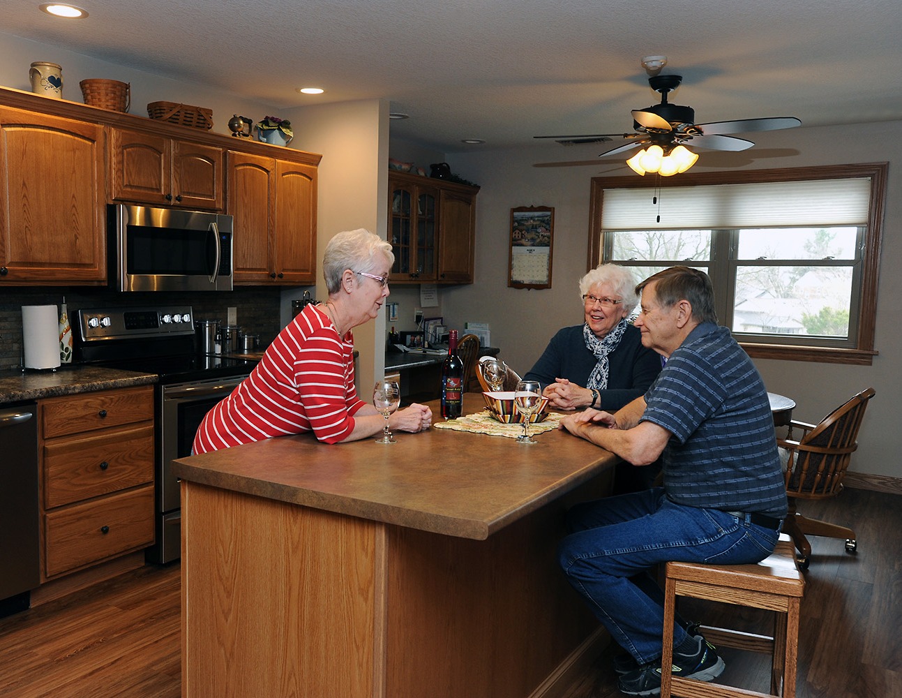 Friends talking in the kitchen