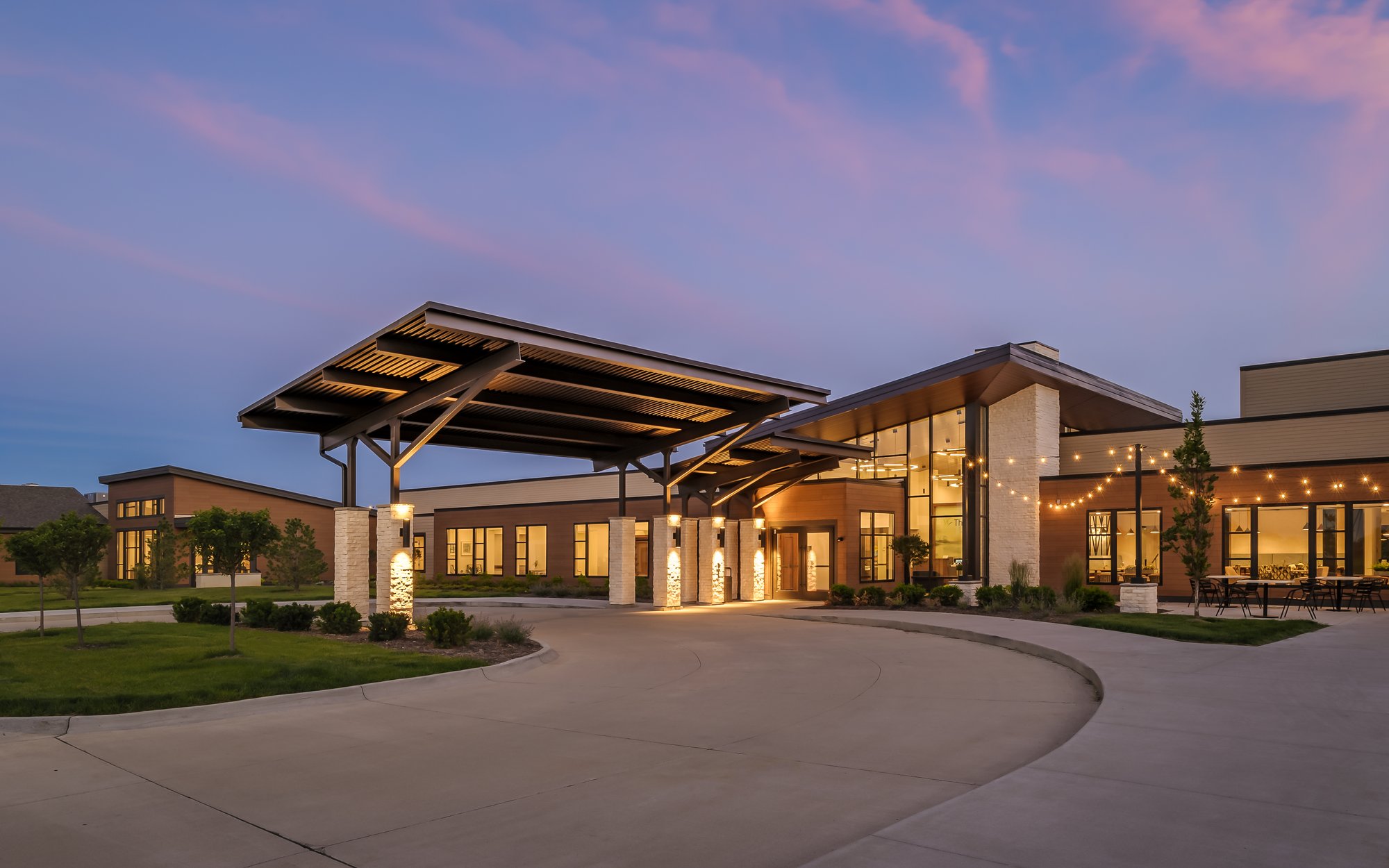 The Summit Bettendorf entrance at sunset