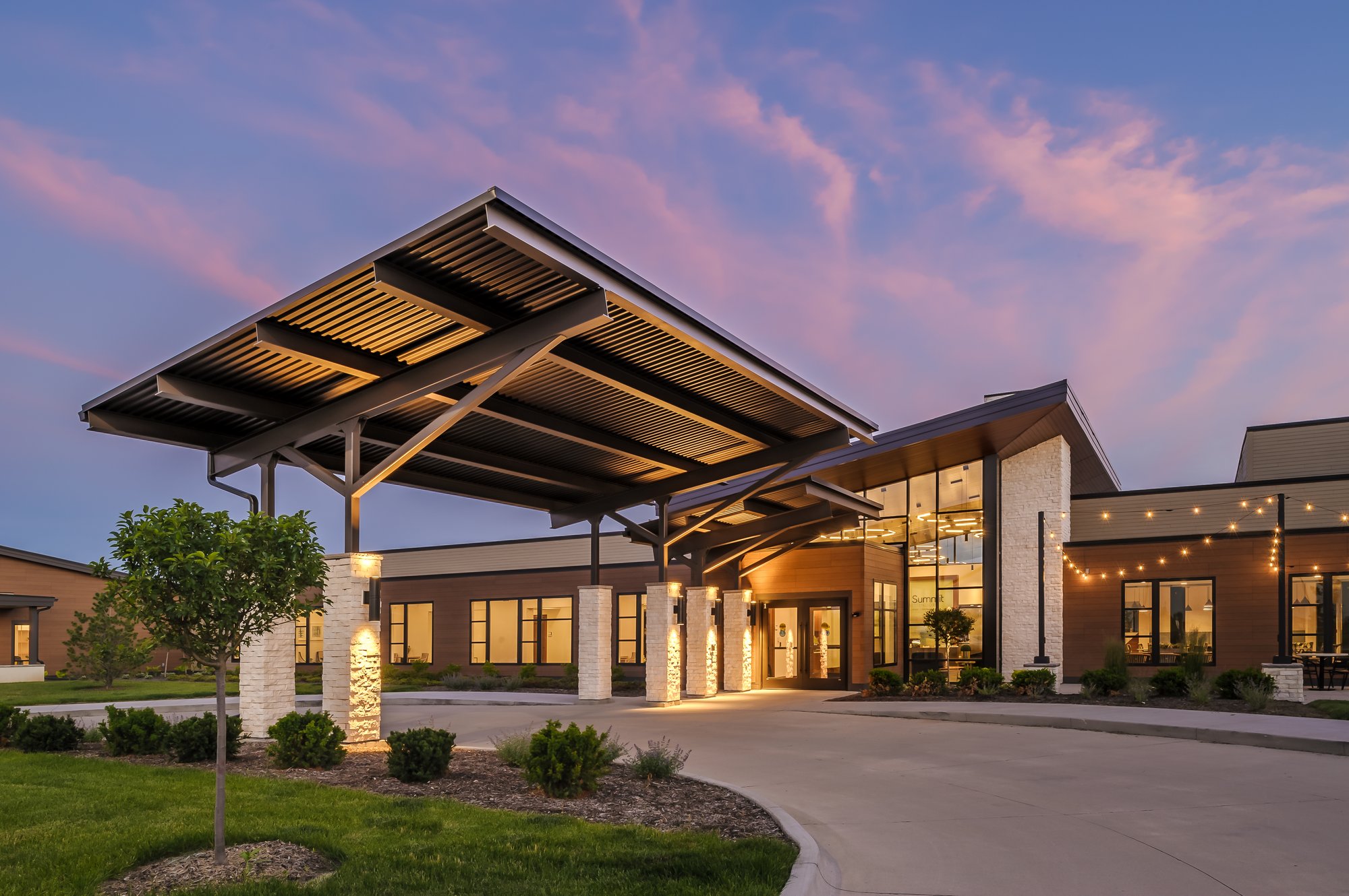 The Summit Bettendorf front entrance sunset