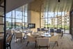 The Summit Bettendorf modern dining room with windows