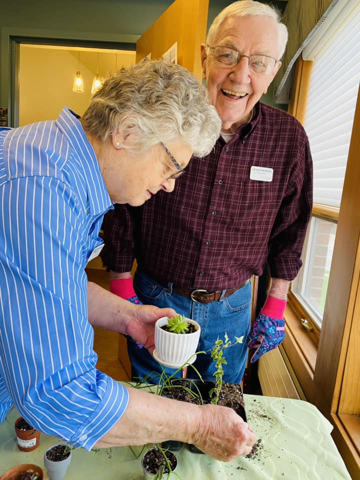 Two residents gardening