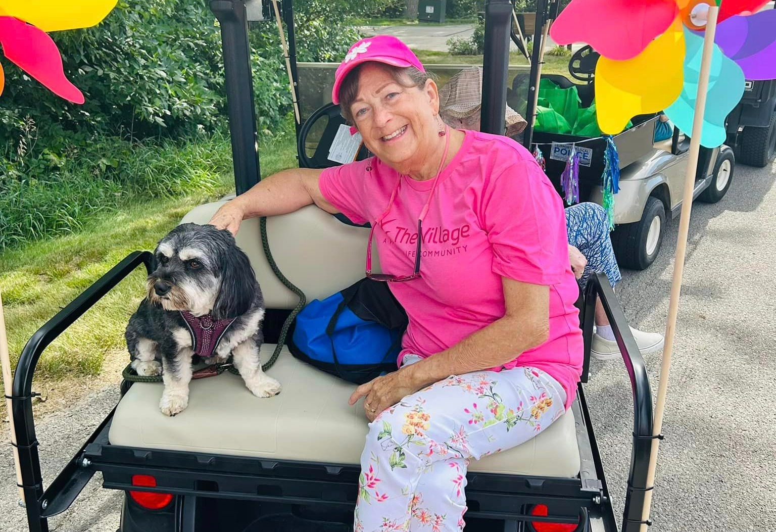 resident smiling with dog