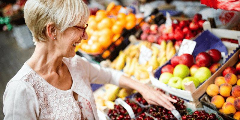 woman shopping at Des Moines farmers market