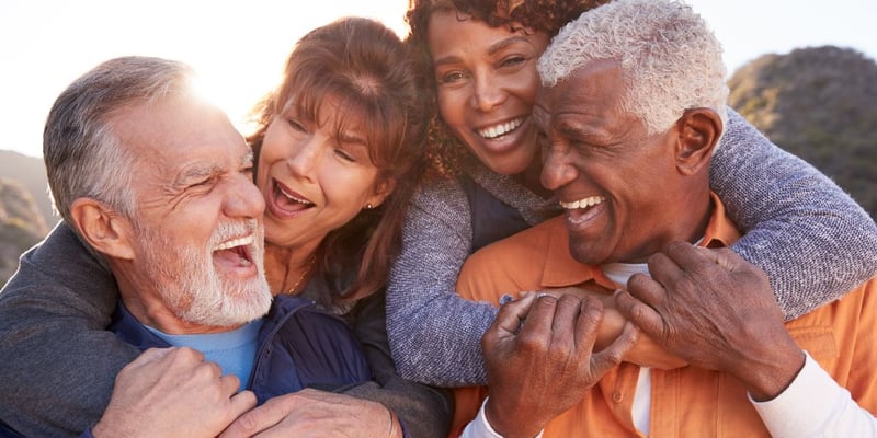 A group of seniors smiling together