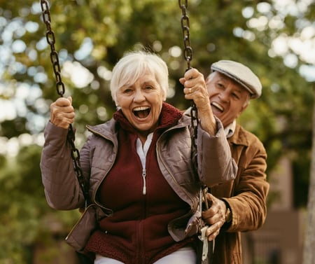 senior couple on a swing