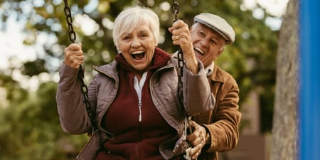 senior couple on a swing