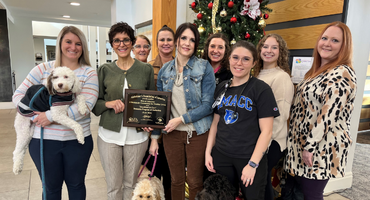 group of caregivers receiving award