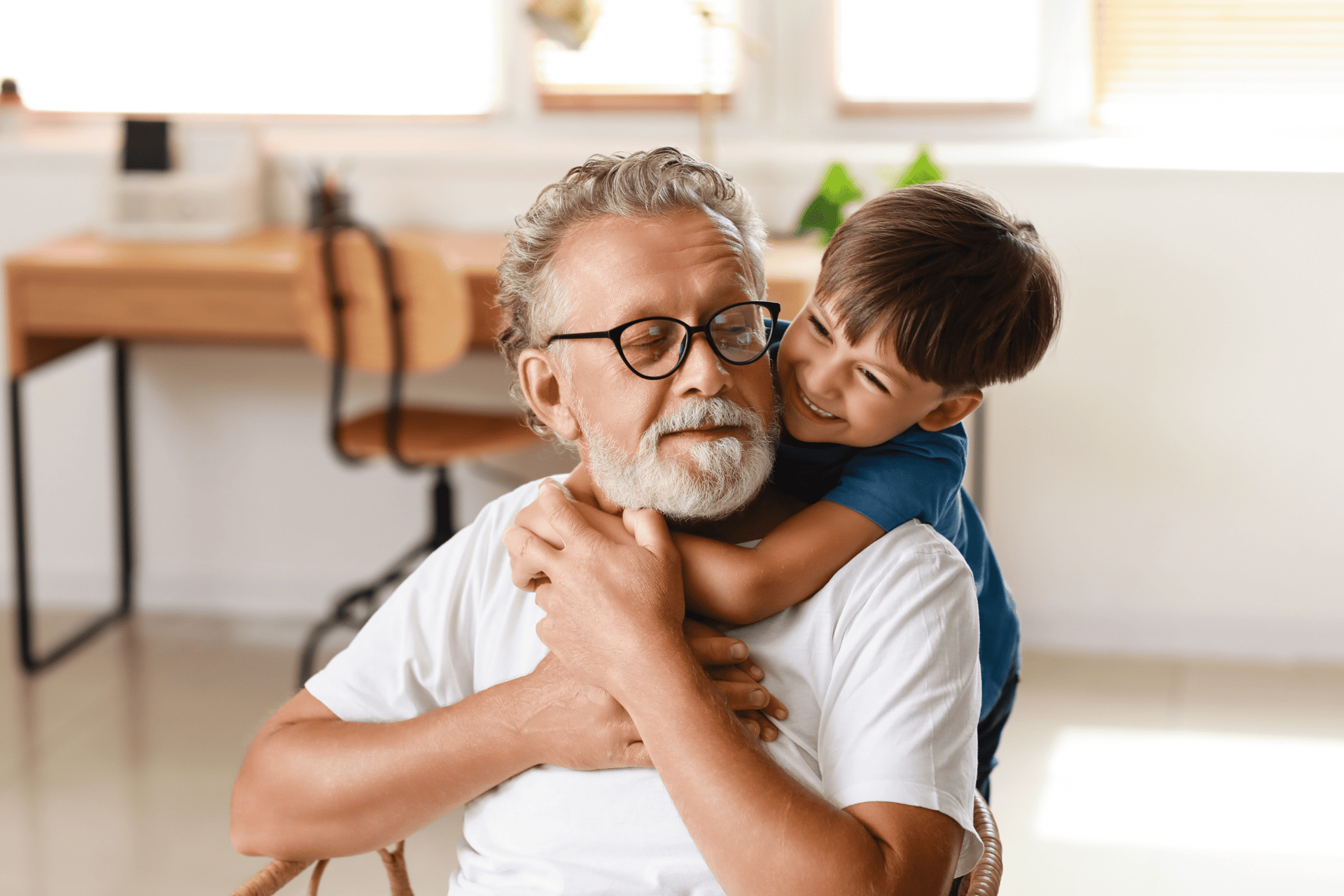 senior grandfather playing with grandson
