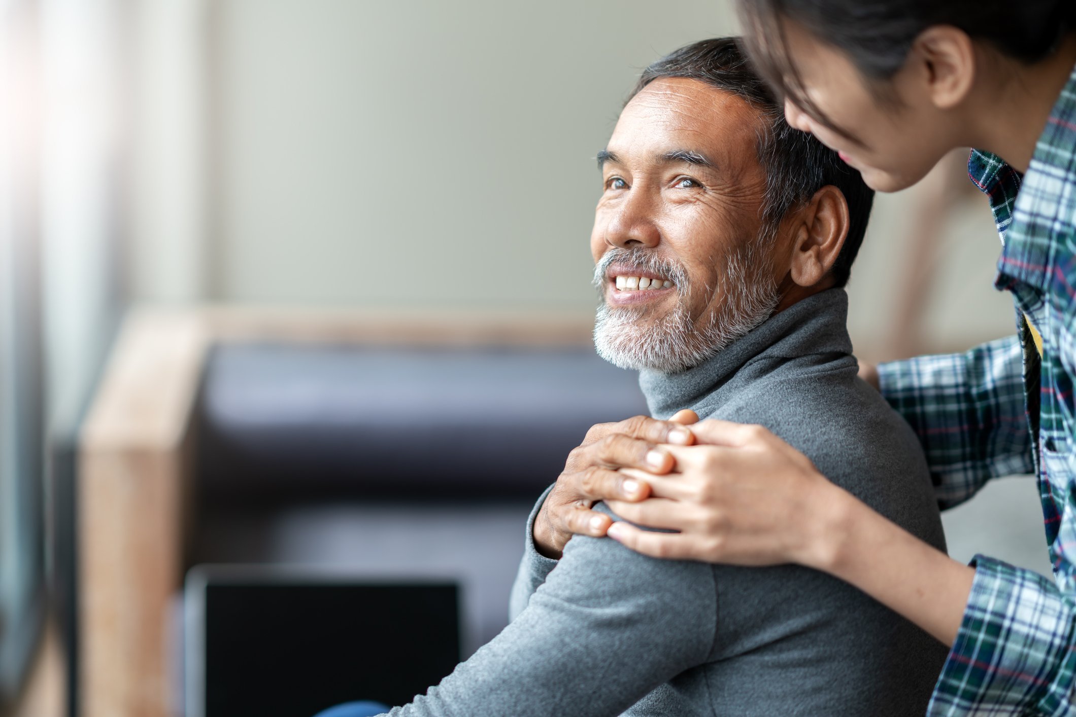 woman comforting man