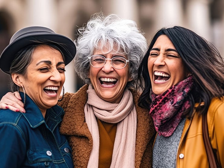 Intergenerational senior women having fun together outdoor at city street
