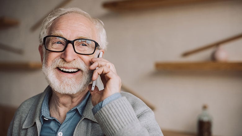 senior man talking by phone