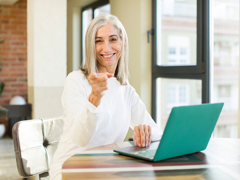 senior pretty woman smiling cheerfully