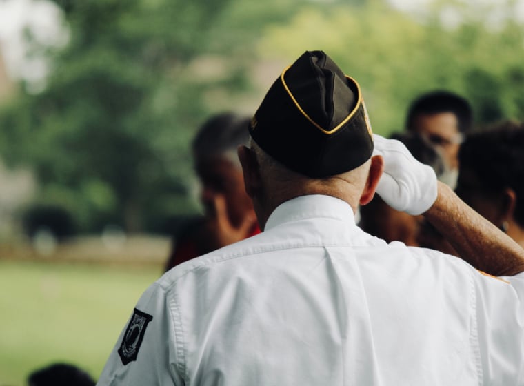 a veteran saluting