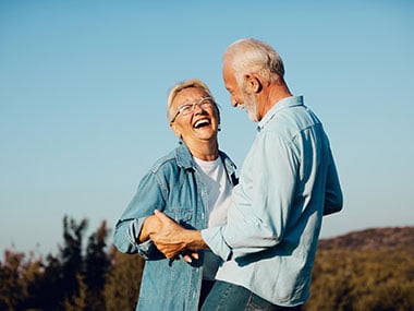 woman man outdoor senior couple happy lifestyle retirement together smiling
