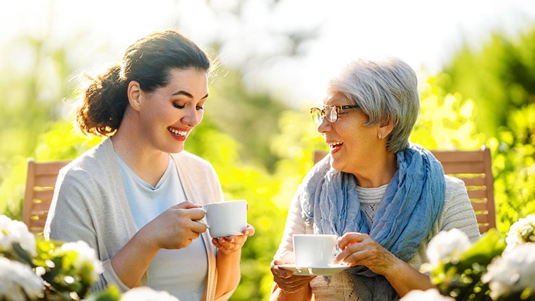 Women drinking tea in the garden