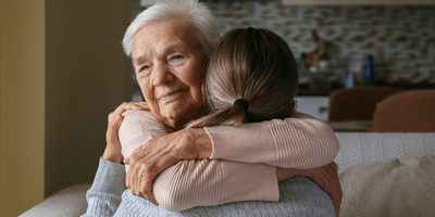 Mother and daughter hugging 