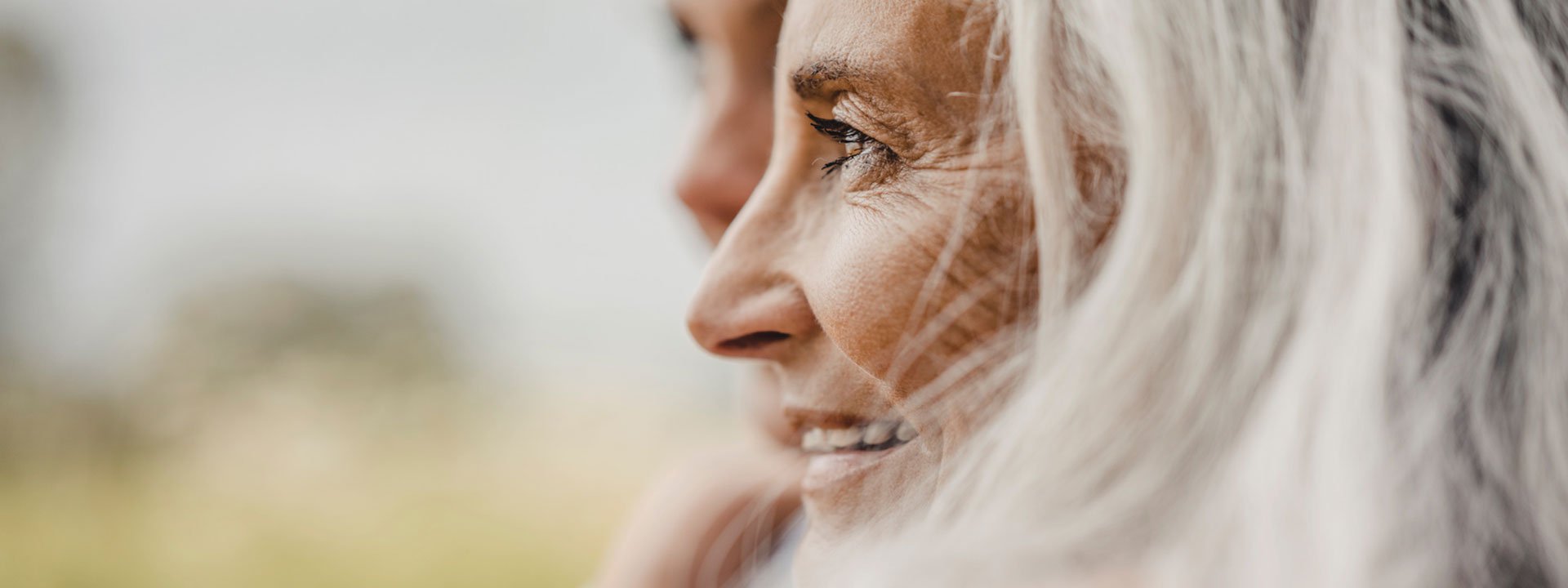 Senior lady smiling to the horizon